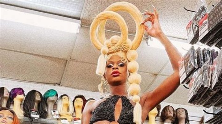 Drag Queen Symone's Stunning Stunt In A Senegalese Twist Little Black Dress