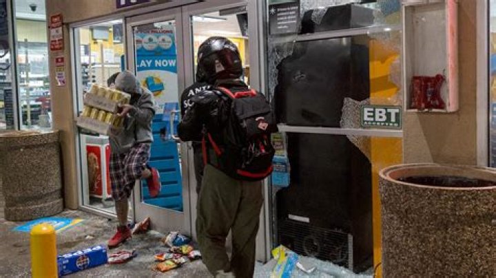 The Visual Aftermath: Captured Images Of Looters